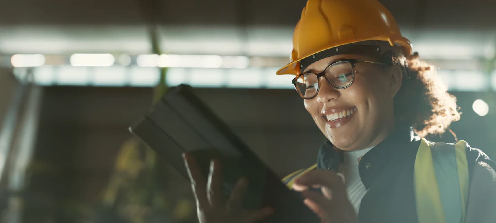 Construction apprentice smiling